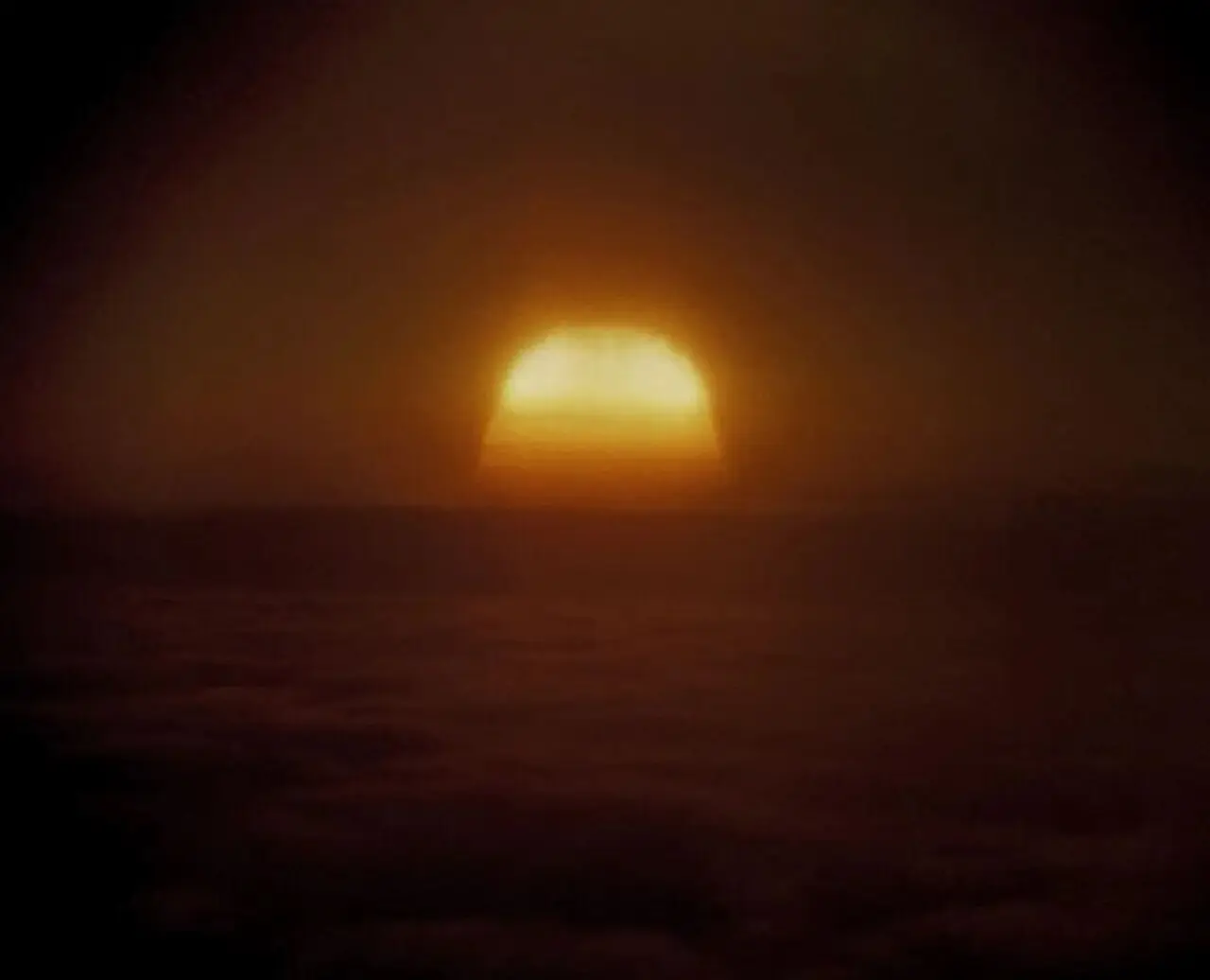 The enormous Tsar Bomba fireball rising over Novaya Zemlya on October 30, 1961: a vast orange mushroom cloud dwarfing the icy landscape below
