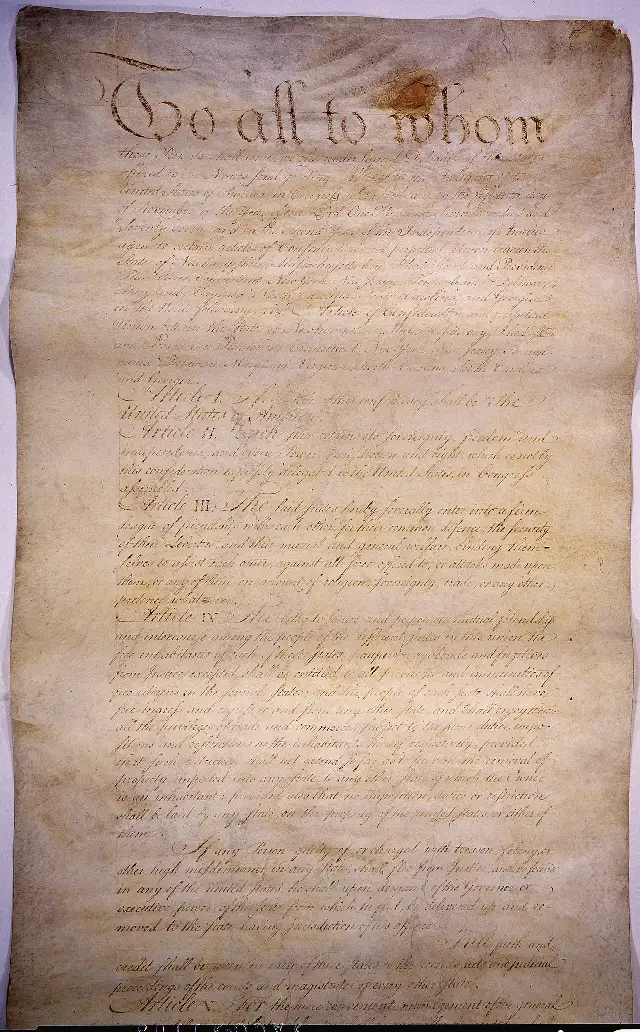 The first page of the engrossed Articles of Confederation, beginning 'To all to whom these Presents shall come,' held by the U.S. National Archives.