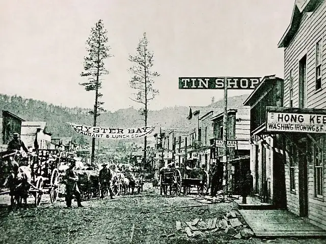 Deadwood, Dakota Territory, photographed in 1876 — the gold-rush town where Wild Bill Hickok was shot that August.