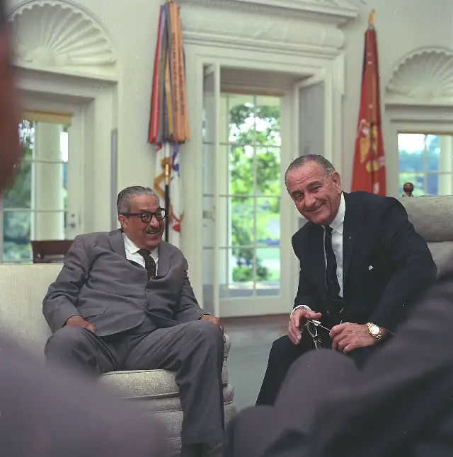 1967 color photograph of Thurgood Marshall and President Lyndon B. Johnson laughing together in the Oval Office
