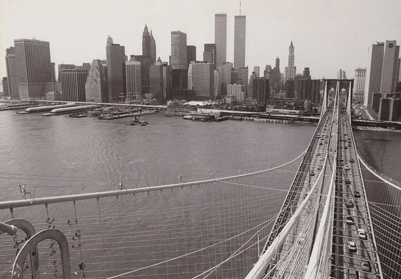 The completed Twin Towers of the World Trade Center, seen from the Brooklyn Bridge in 1983.