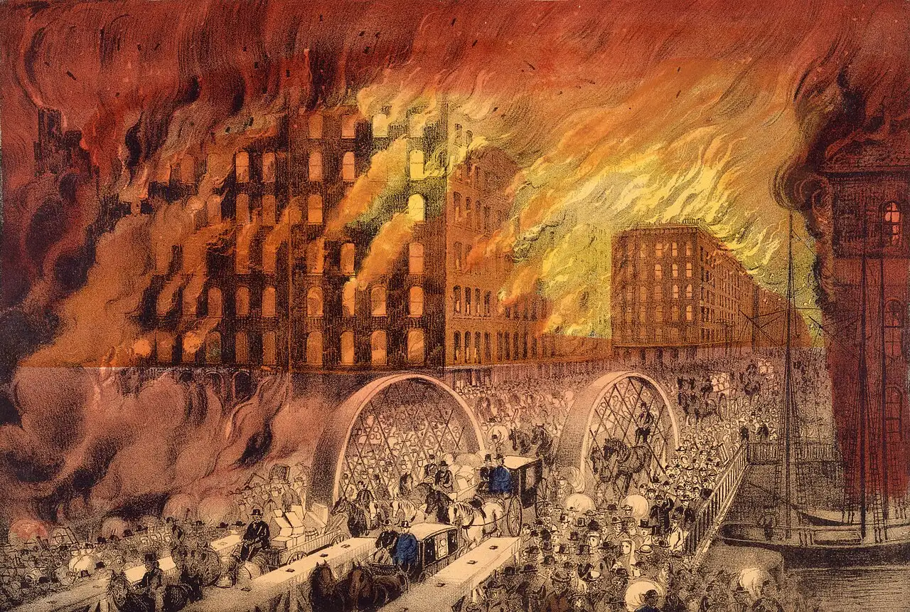 Currier & Ives' 1871 color engraving 'Chicago in Flames,' showing downtown buildings consumed by towering fire while crowds of people and carriages flee across a bridge in the foreground.