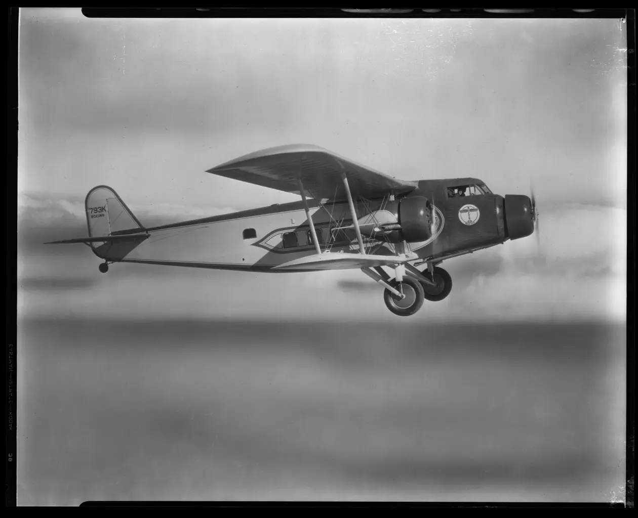 A Boeing 80A biplane airliner in flight — the same type of aircraft Ellen Church served aboard as a flight attendant in 1930.