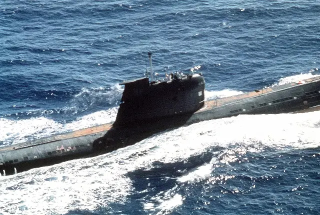 A Soviet Foxtrot-class submarine, the same class as B-59, running on the surface of the sea, photographed by the U.S. Navy.