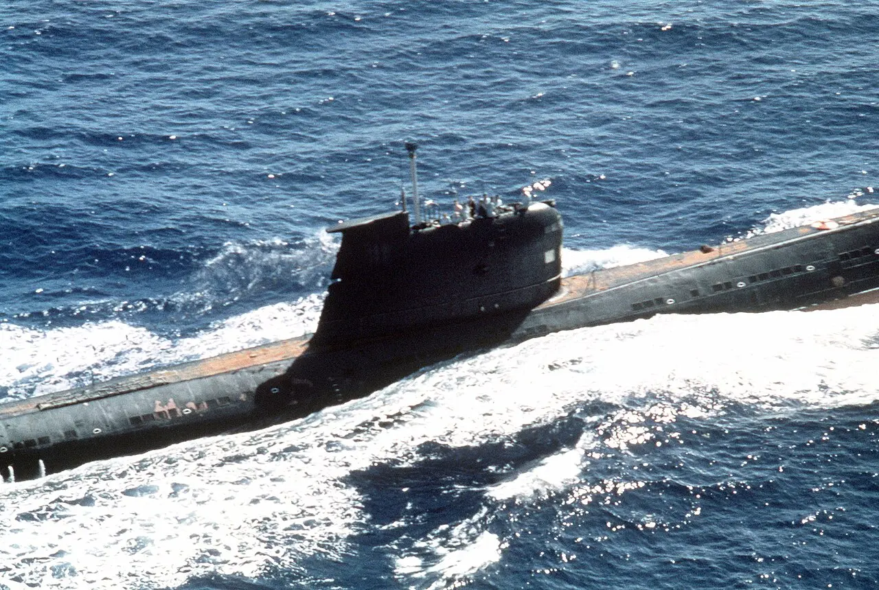 A Soviet Foxtrot-class submarine, the same class as B-59, running on the surface of the sea, photographed by the U.S. Navy.