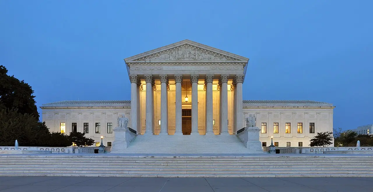 Panorama of the west facade of the United States Supreme Court Building at dusk in Washington, D.C.