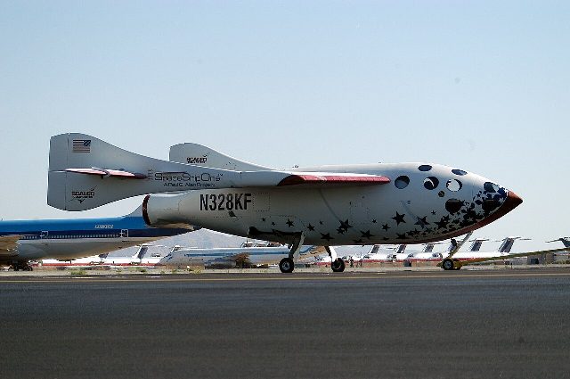 Test pilot Mike Melvill beside SpaceShipOne after the June 21, 2004 flight — the first privately funded human spaceflight.