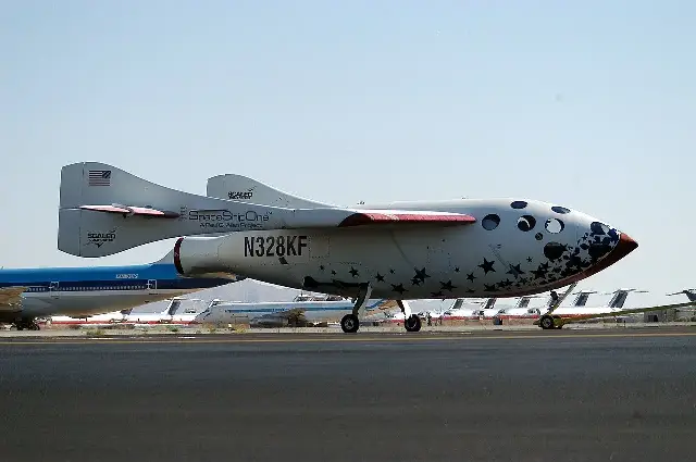 Test pilot Mike Melvill beside SpaceShipOne after the June 21, 2004 flight — the first privately funded human spaceflight.