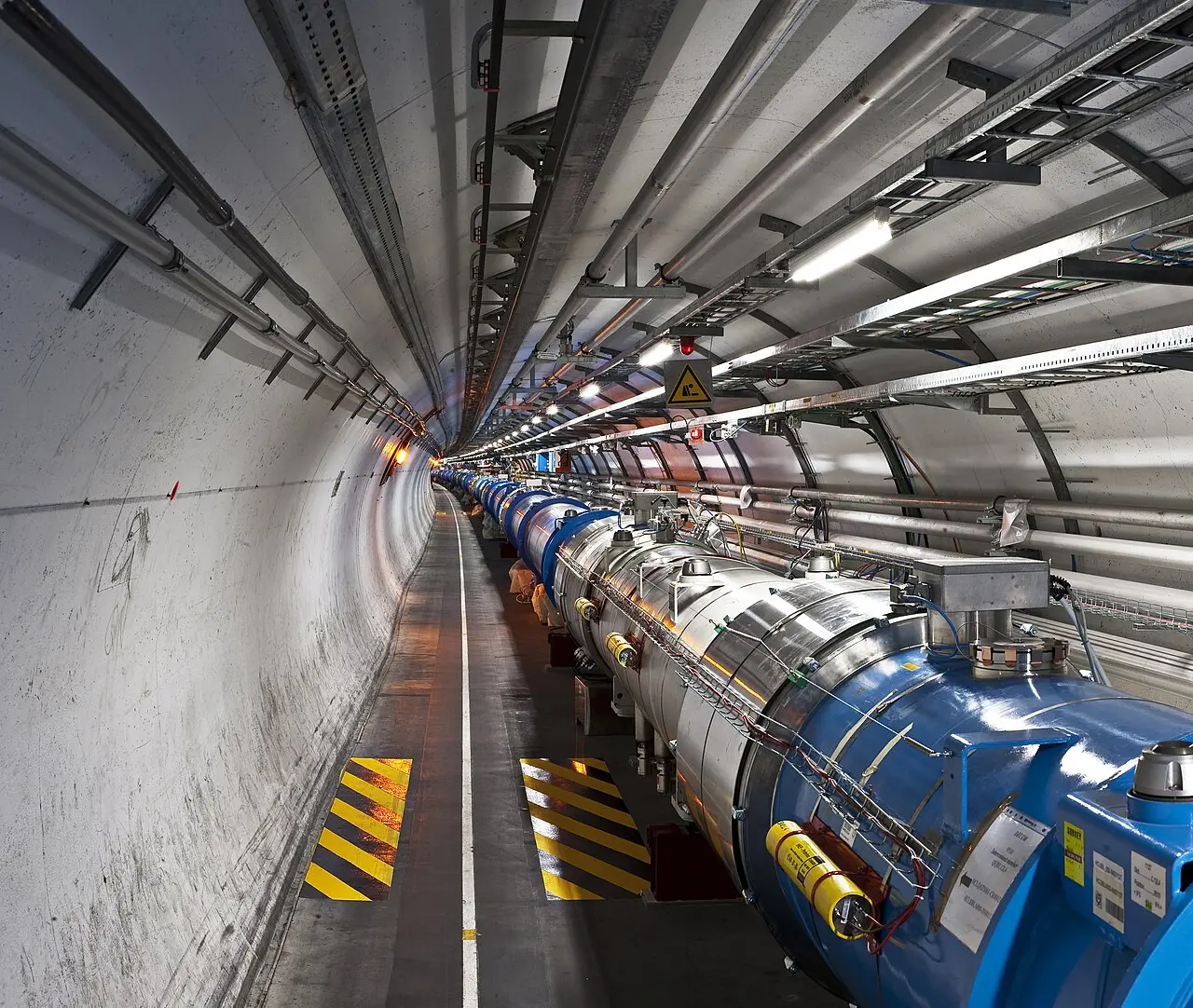 Inside the Large Hadron Collider tunnel: the 27-kilometer ring of superconducting magnets, photographed in sector 3-4.