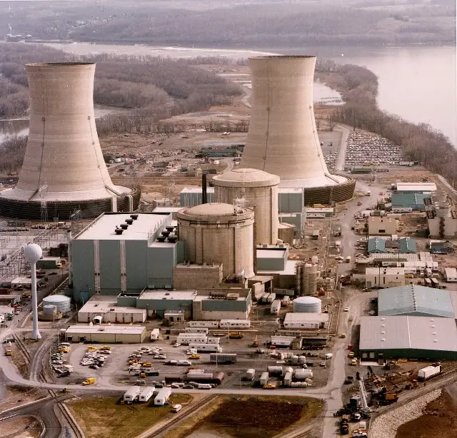 1979 aerial view of the Three Mile Island nuclear generating station with its two cooling towers.