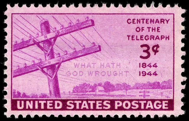Illustrative: the 1944 U.S. 3-cent postage stamp issued for the centenary of Morse's first telegraph message, showing telegraph poles and the words 'What hath God wrought'.