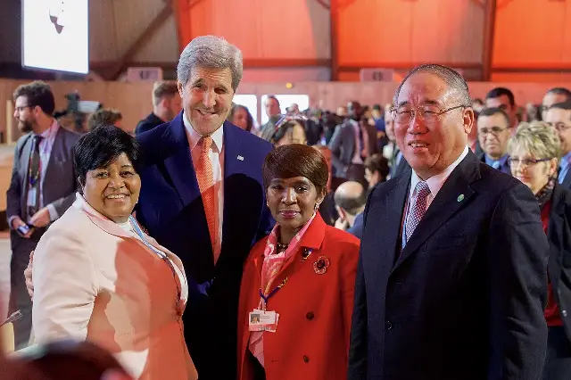 Delegates, including U.S. Secretary of State John Kerry, in the plenary hall during the COP21 climate conference in Paris.
