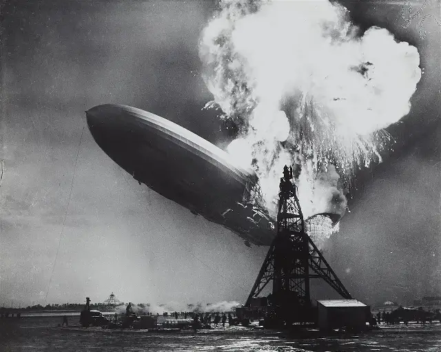 The German airship Hindenburg burning at its mooring mast at Lakehurst, New Jersey, on May 6, 1937.