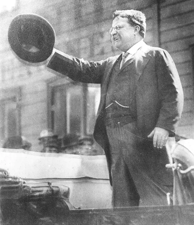 Theodore Roosevelt speaking from an open car to a crowd in Milwaukee on October 14, 1912, shortly before he was shot.