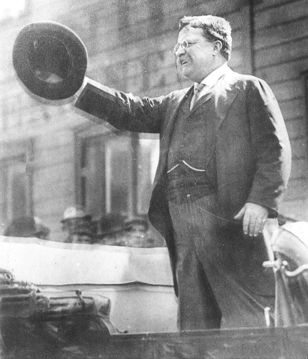 Theodore Roosevelt speaking from an open car to a crowd in Milwaukee on October 14, 1912, shortly before he was shot.