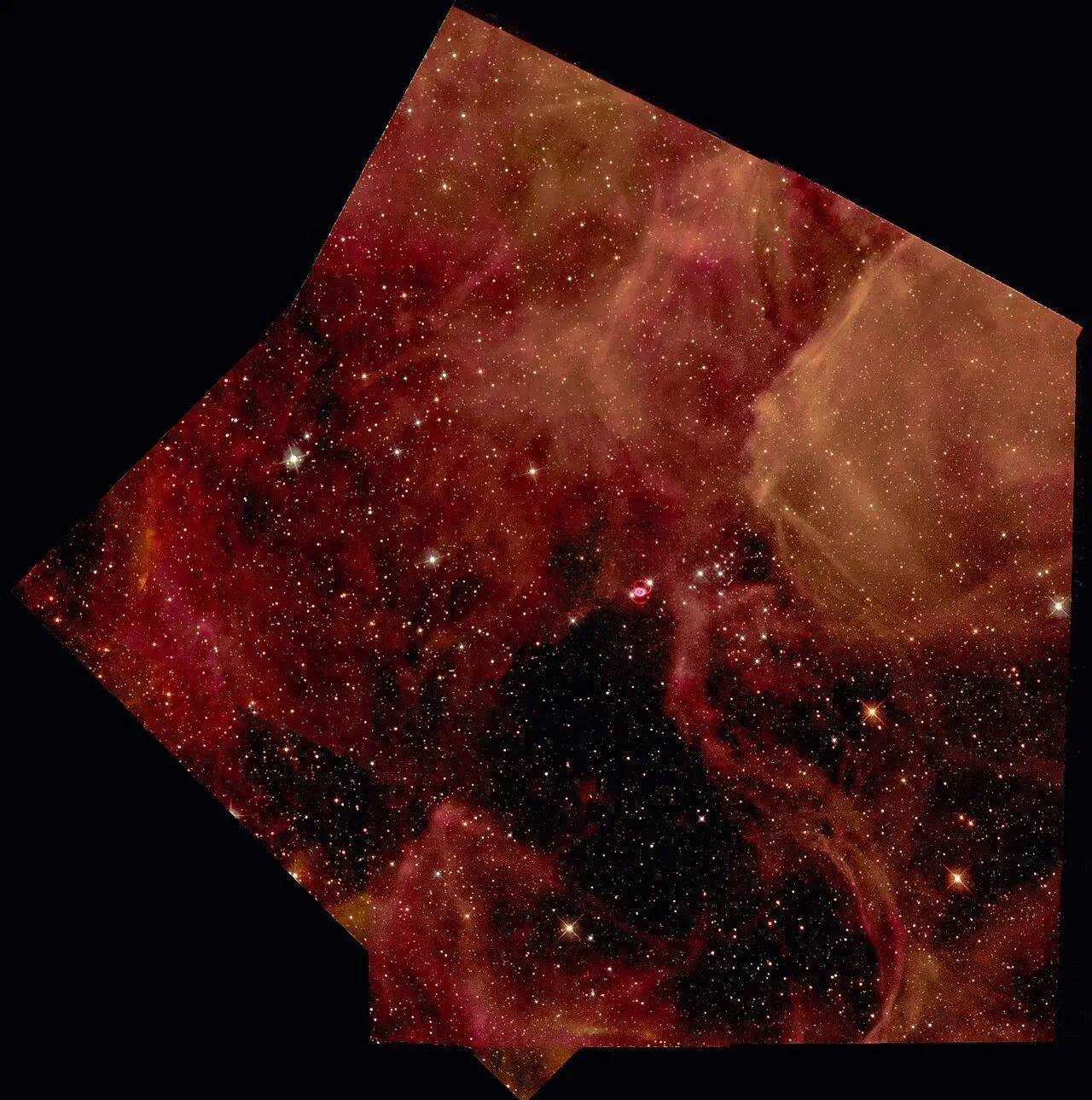 Hubble Space Telescope image of supernova SN 1987A glowing in the Large Magellanic Cloud