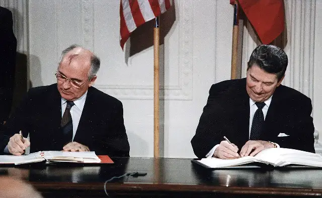 President Ronald Reagan and Soviet leader Mikhail Gorbachev signing the INF Treaty in the White House East Room, December 8, 1987