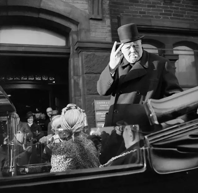 Winston Churchill giving his V-for-victory sign in Bradford, December 1942 — a wartime photo, not from the day he became prime minister.