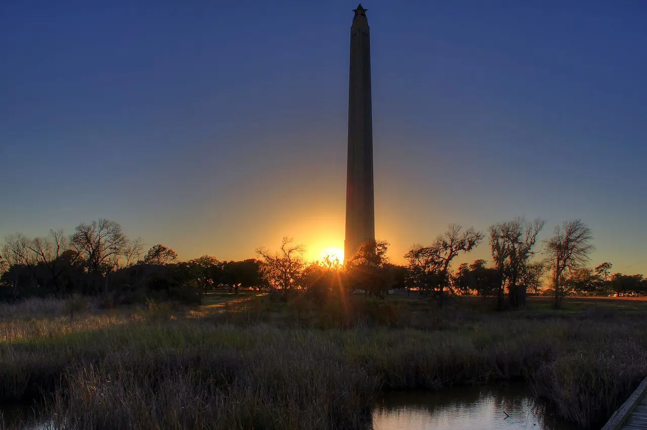 The San Jacinto Monument at sunset, standing on the Texas battlefield where Houston's Texians won independence in 1836.
