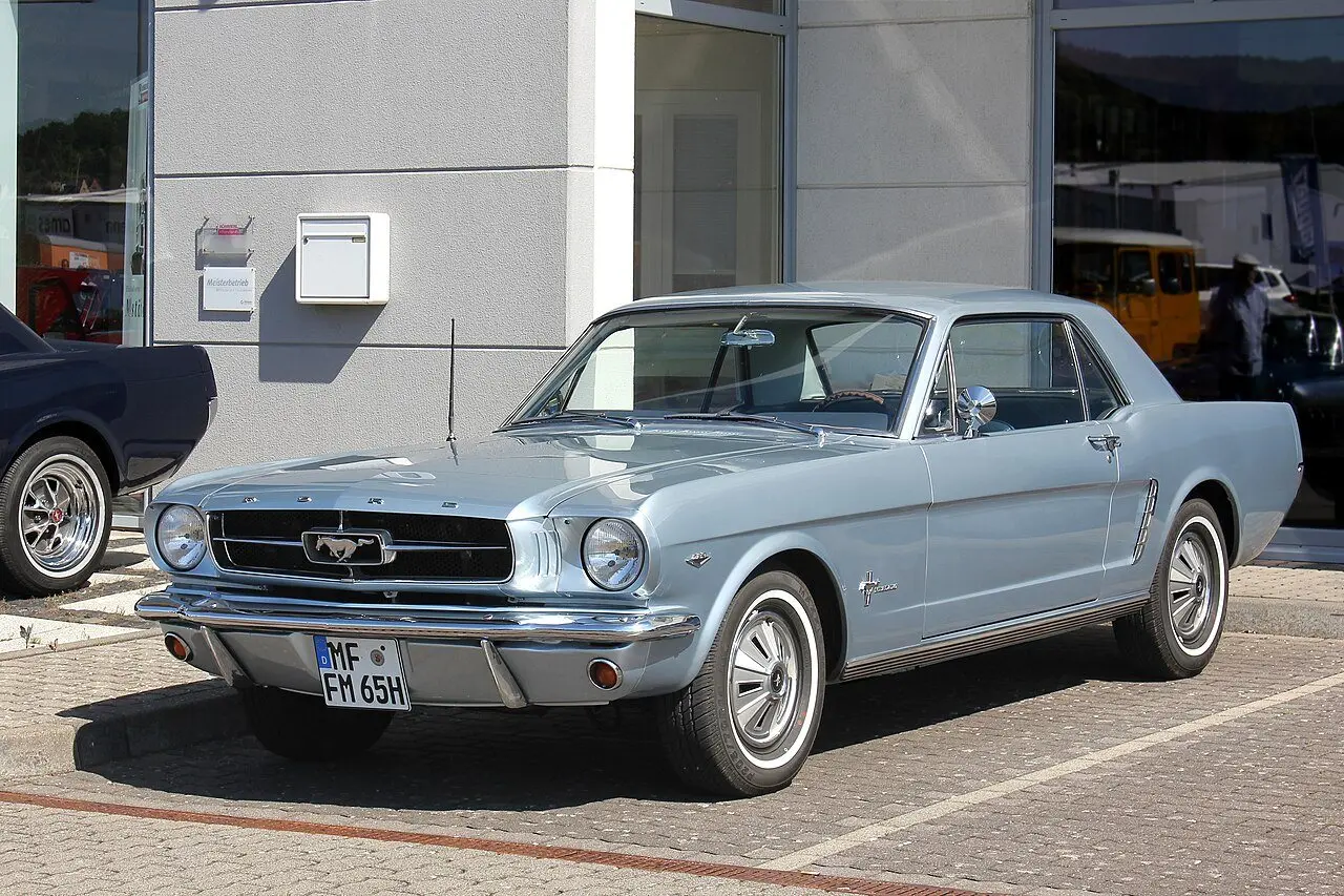A surviving first-generation Ford Mustang (1965 model), illustrative of the '1964 1/2' Mustang unveiled on April 17, 1964 — not the World's Fair car.