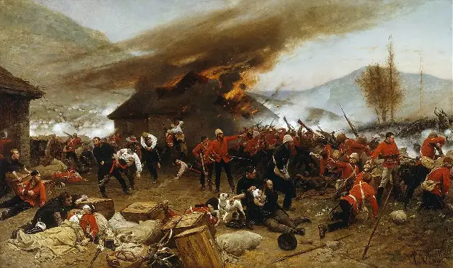 Alphonse de Neuville's 1880 painting of the defence of Rorke's Drift, showing British soldiers in red coats firing from behind barricades as the mission hospital burns.