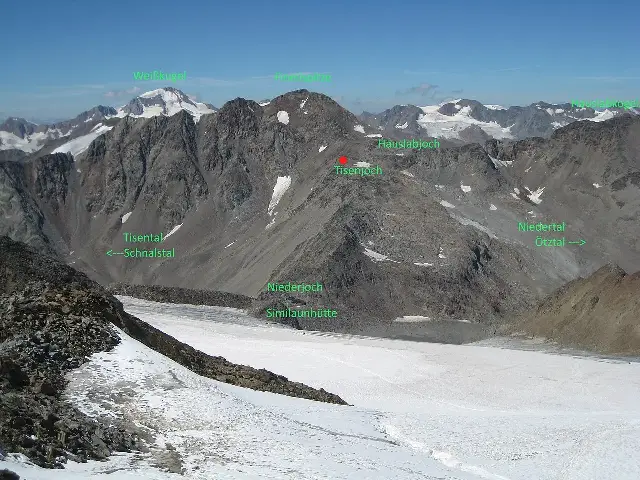 The Otztal Alps near the Tisenjoch pass, with a red marker showing the exact spot where Otzi the Iceman was found in 1991