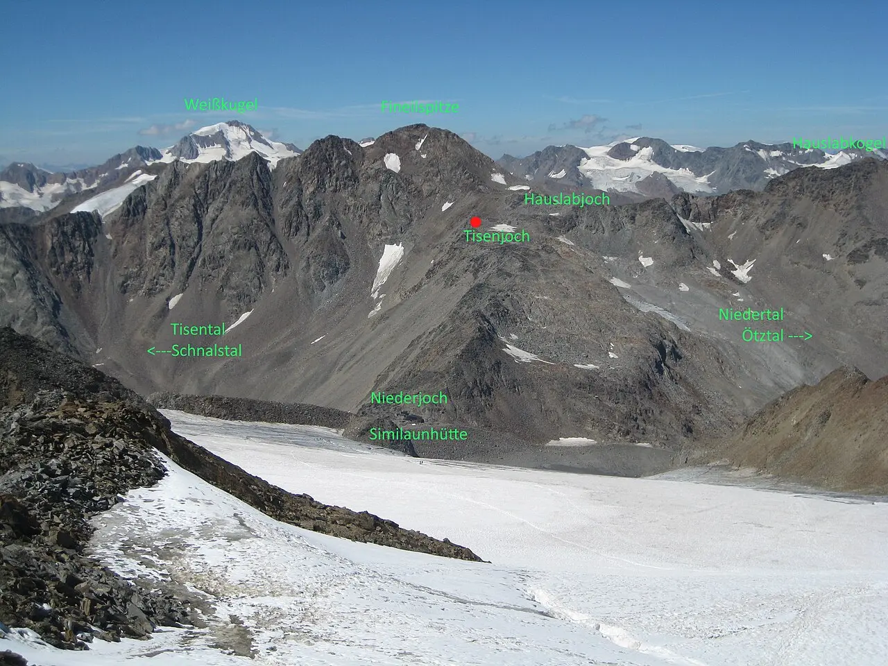 The Otztal Alps near the Tisenjoch pass, with a red marker showing the exact spot where Otzi the Iceman was found in 1991