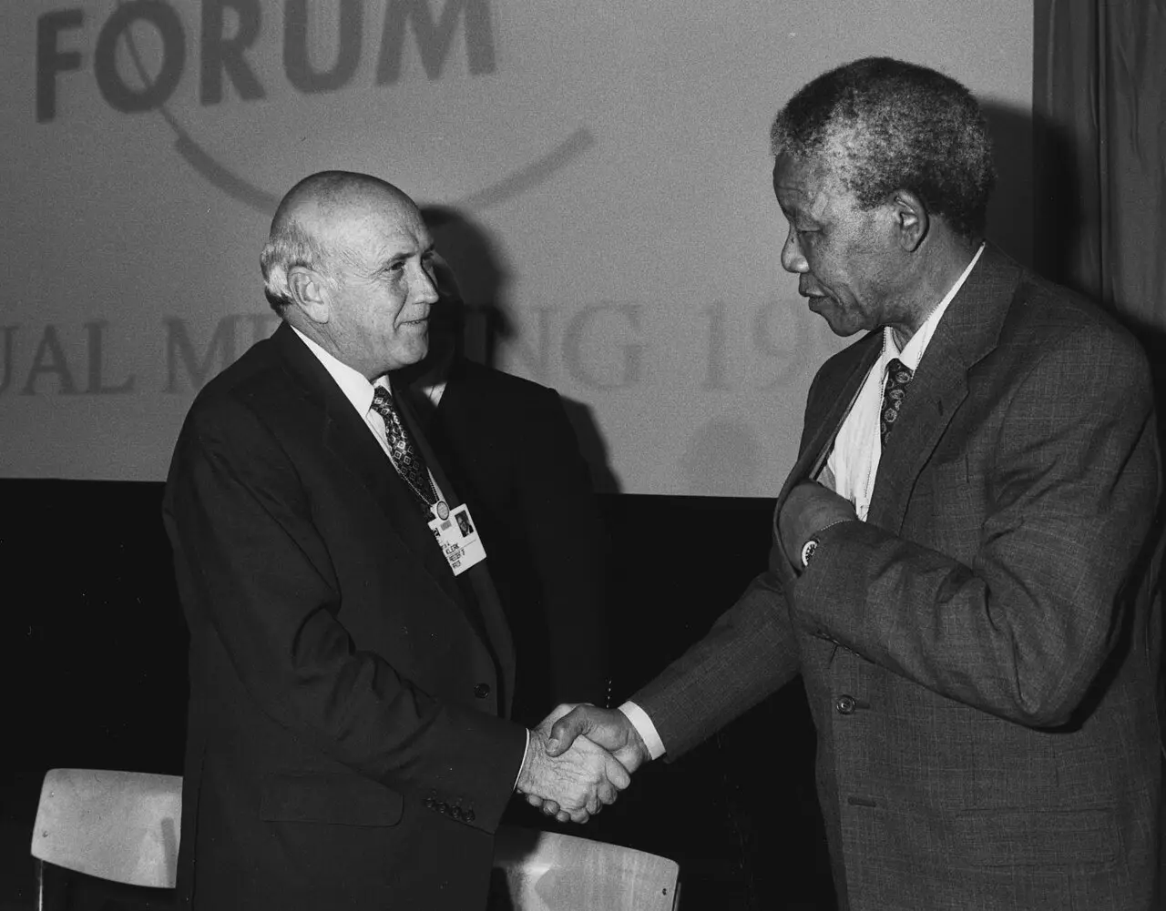 Nelson Mandela shakes hands with F. W. de Klerk at Davos in January 1992.