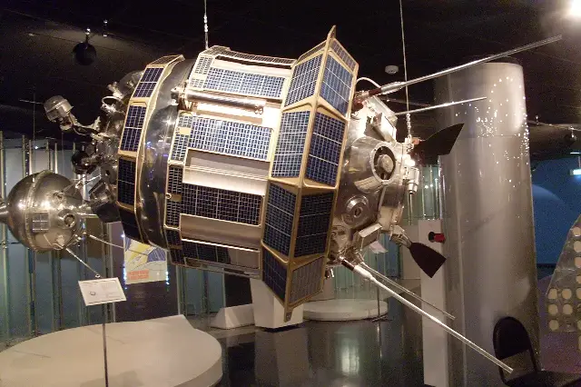 A replica of the Luna 3 spacecraft, with its solar panels and camera port, in the Memorial Museum of Astronautics in Moscow.