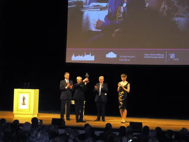Stanislav Petrov holding the Dresden Peace Prize at the Semperoper in Dresden, 2013