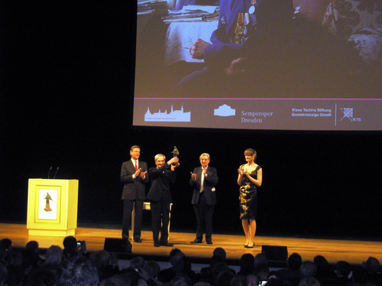 Stanislav Petrov holding the Dresden Peace Prize at the Semperoper in Dresden, 2013
