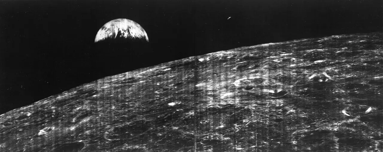The crescent Earth rising above the Moon's surface, photographed by NASA's Lunar Orbiter 1 on August 23, 1966.