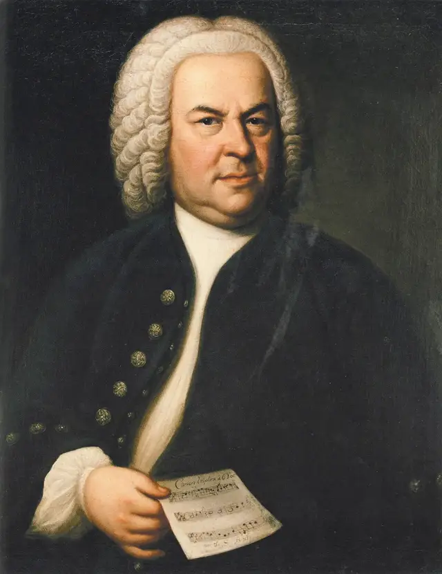 Oil portrait of Johann Sebastian Bach by Elias Gottlob Haussmann, showing the composer in a white wig holding a sheet of music.