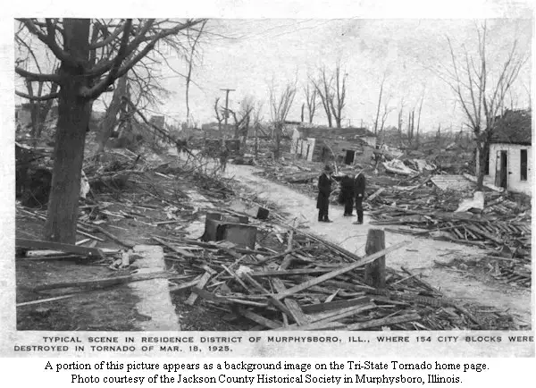 A 1925 postcard showing a devastated residential street in Murphysboro, Illinois, with splintered homes and debris after the Tri-State Tornado.