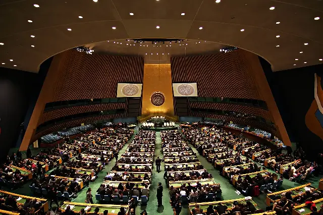 The United Nations General Assembly hall in New York, packed with delegates during a session.