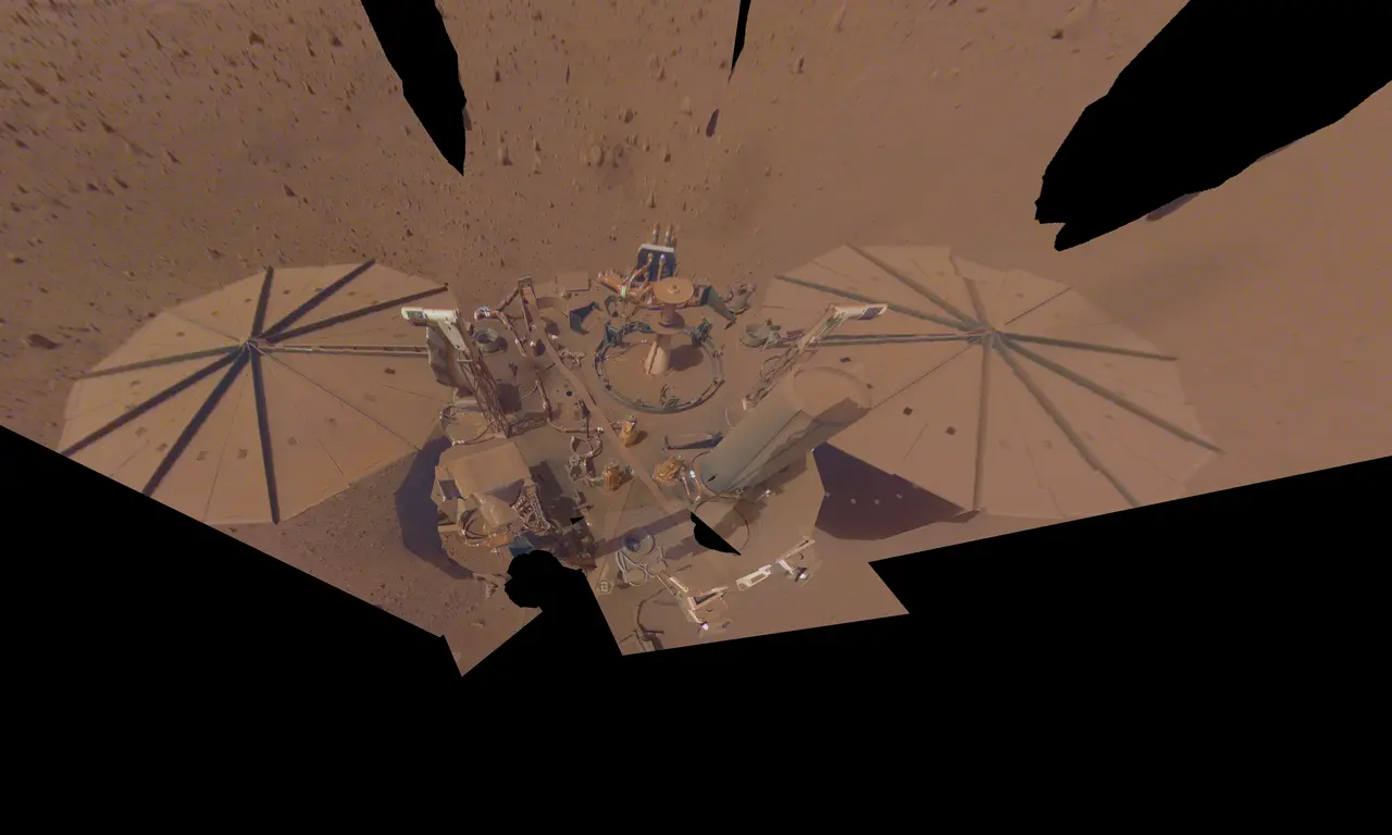 NASA's InSight lander photographed by itself in a 2022 selfie mosaic on the Martian surface at Elysium Planitia (illustrative of the 2018 landing).