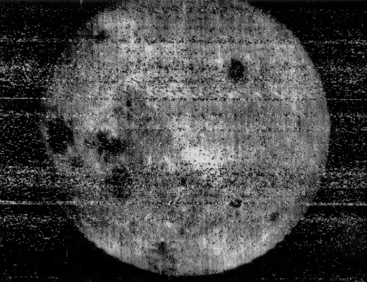 Grainy black-and-white photograph of the Moon's far side taken by the Soviet Luna 3 spacecraft on October 7, 1959 — the first image of the lunar far side ever captured.