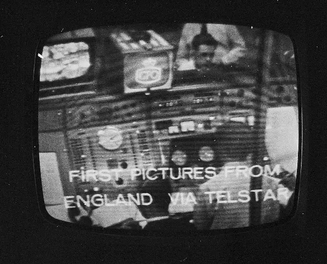 A 1962 television monitor displaying the words 'First pictures from England via Telstar.'