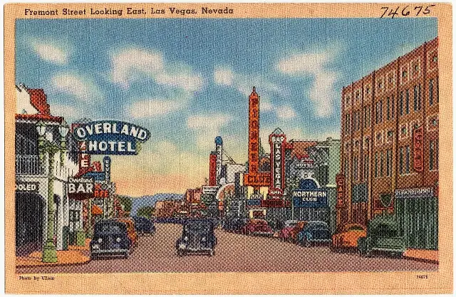 Vintage Tichnor Bros. linen postcard of Fremont Street looking east in Las Vegas, Nevada, circa 1930–1945, with early hotel and casino signs including the Pioneer Club and Northern Club.