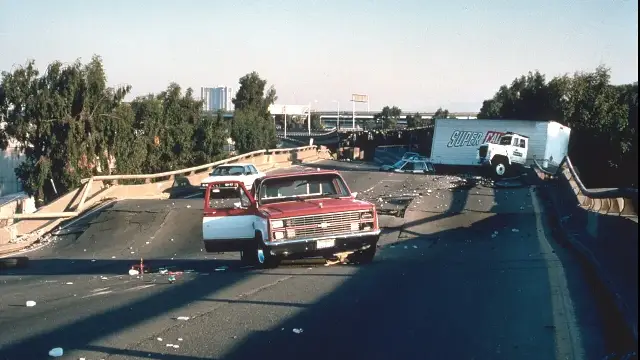 Cars stranded on the broken, collapsed upper deck of the double-decker Nimitz Freeway in Oakland after the 1989 Loma Prieta earthquake.