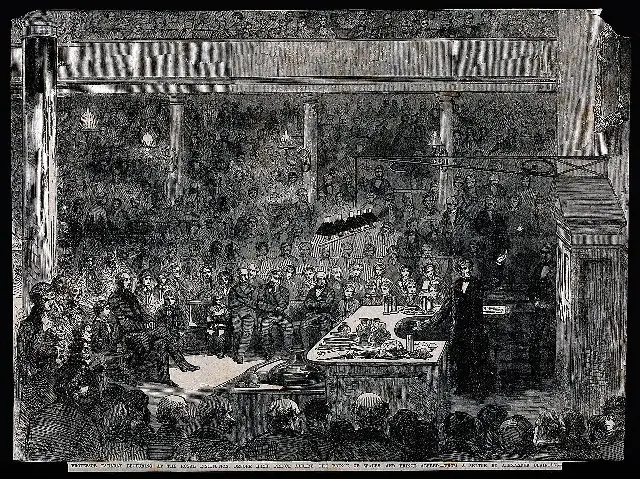 An 1856 engraving of Michael Faraday lecturing at the Royal Institution in London, with Prince Albert, the Prince of Wales, and Prince Alfred in the audience.