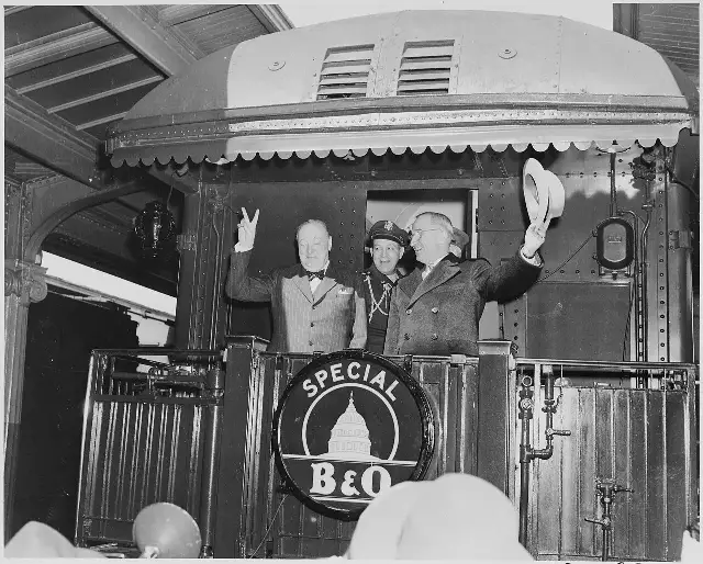 President Harry Truman and Winston Churchill on the rear platform of their train en route to Fulton, Missouri, March 1946.