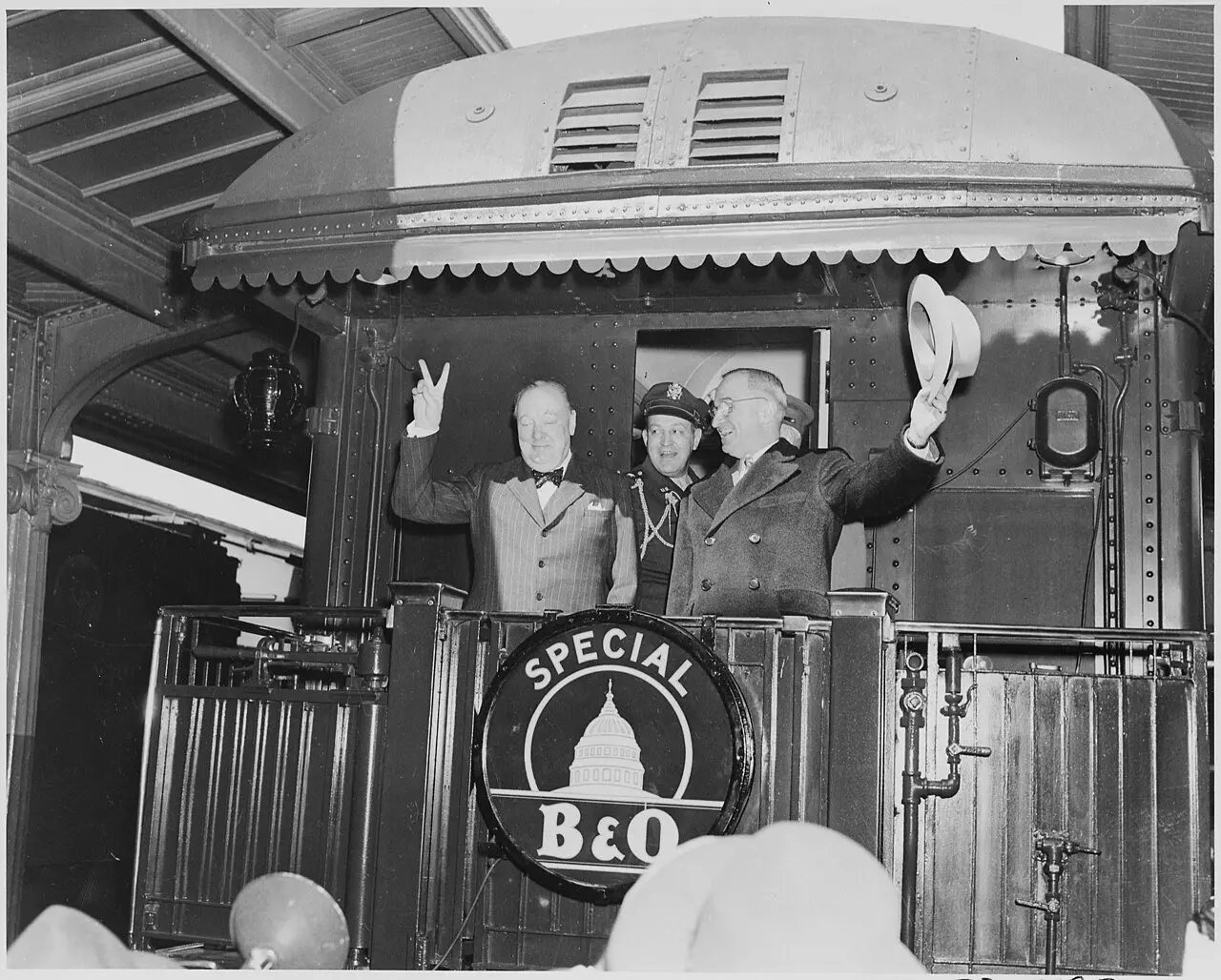 President Harry Truman and Winston Churchill on the rear platform of their train en route to Fulton, Missouri, March 1946.