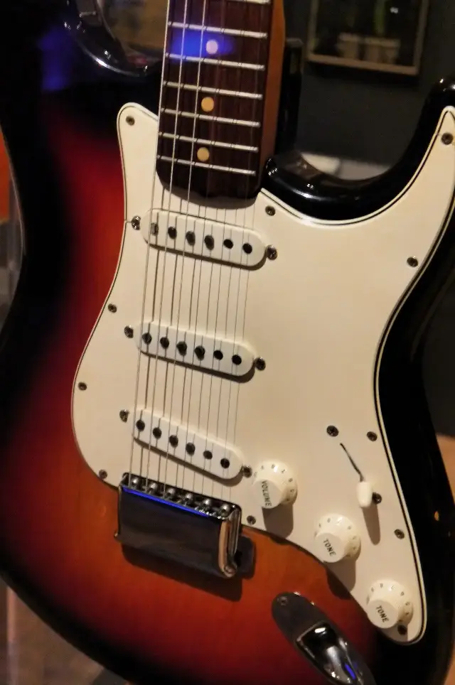 Close-up of Bob Dylan's 1964 sunburst Fender Stratocaster, the guitar he played when he went electric at Newport on July 25, 1965.