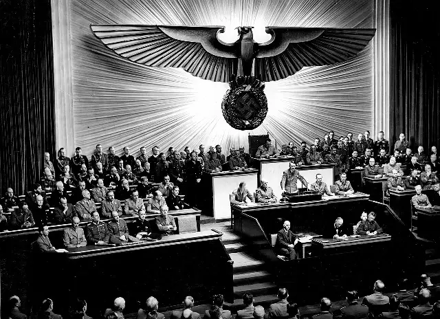 Black-and-white photograph of Adolf Hitler addressing a Reichstag session in Berlin on December 11, 1941.