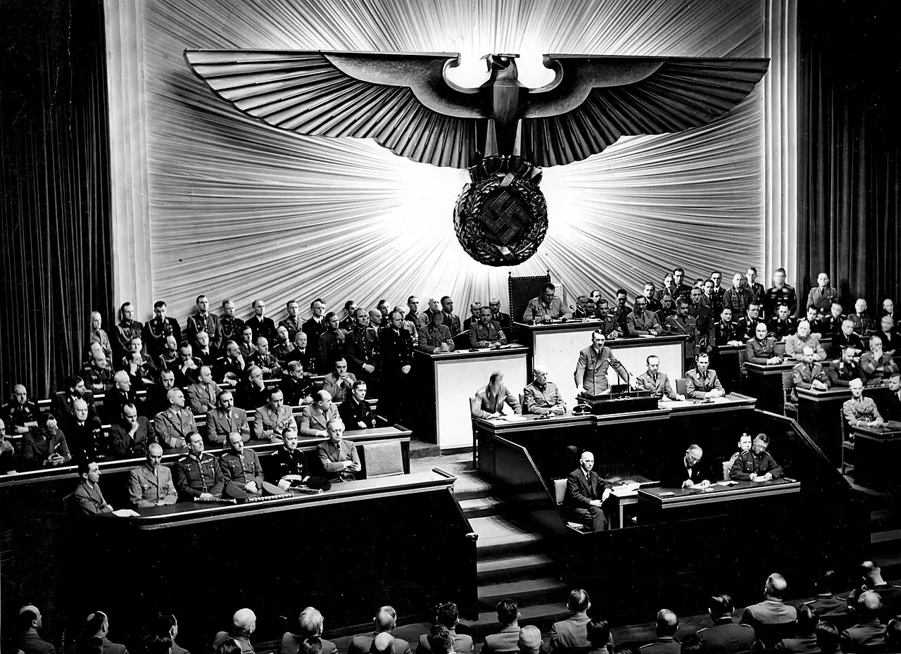 Black-and-white photograph of Adolf Hitler addressing a Reichstag session in Berlin on December 11, 1941.