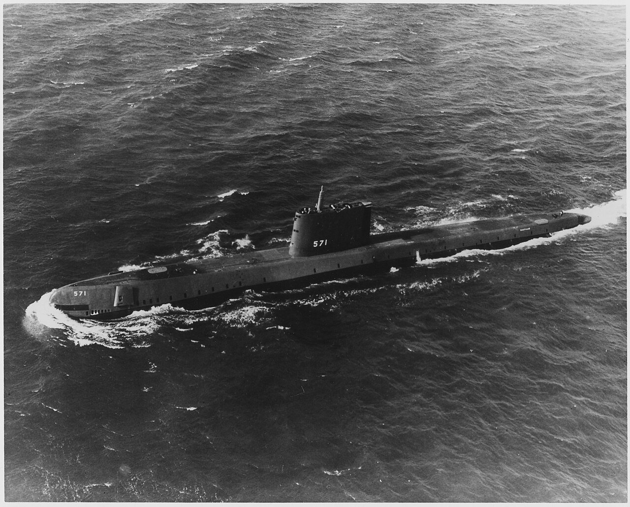 The nuclear submarine USS Nautilus (SSN-571) underway on her initial sea trials in January 1955, three years before her North Pole voyage.