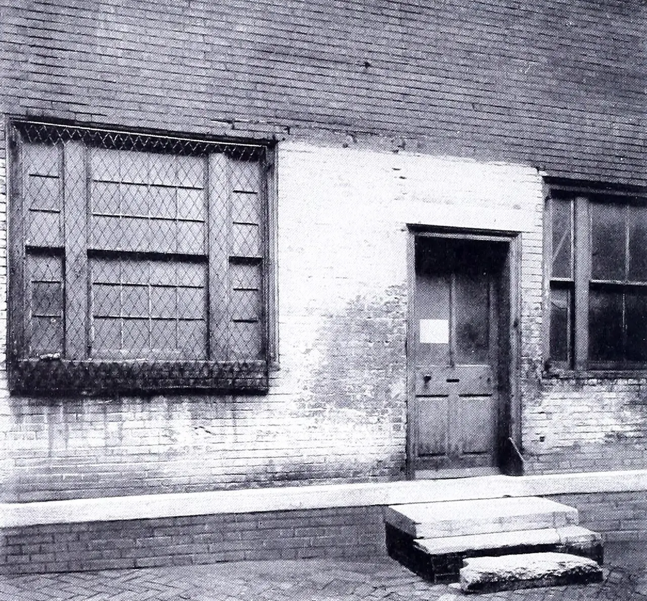 The first U.S. Mint building in Philadelphia, photographed in 1904 — a later photograph; illustrative.