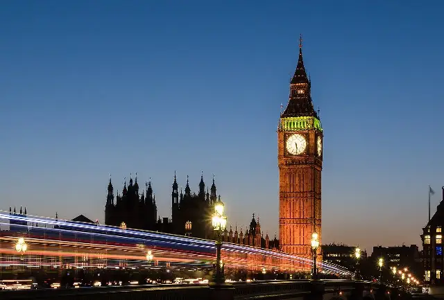 Big Ben and the Elizabeth Tower at sunset, photographed in 2014 (modern photo, illustrative).