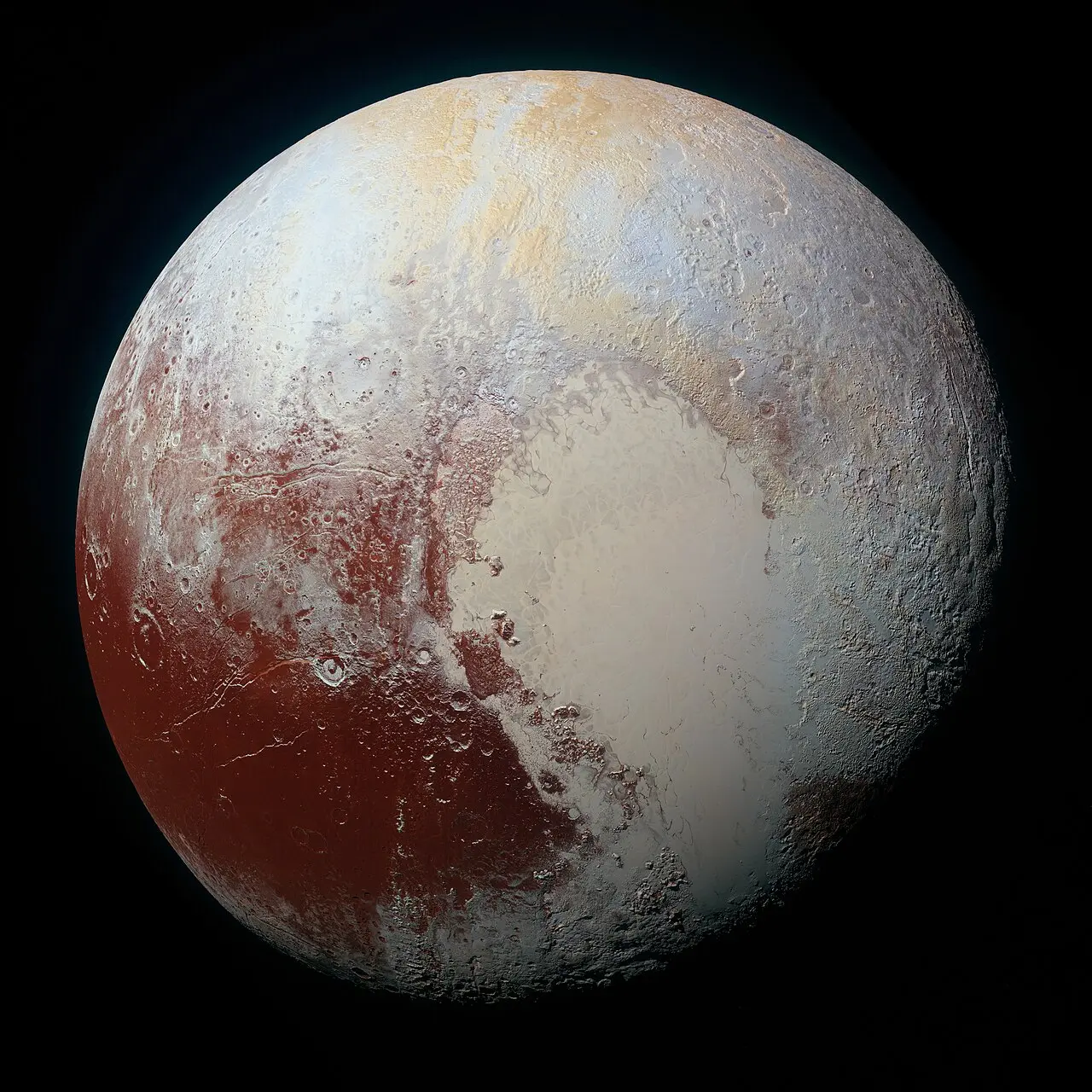 Pluto in enhanced color, photographed by NASA's New Horizons spacecraft.